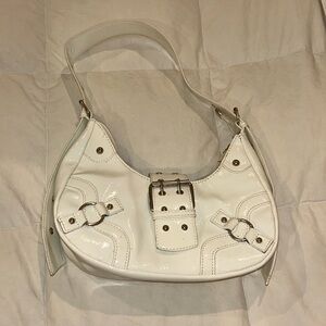 White leather bag.
